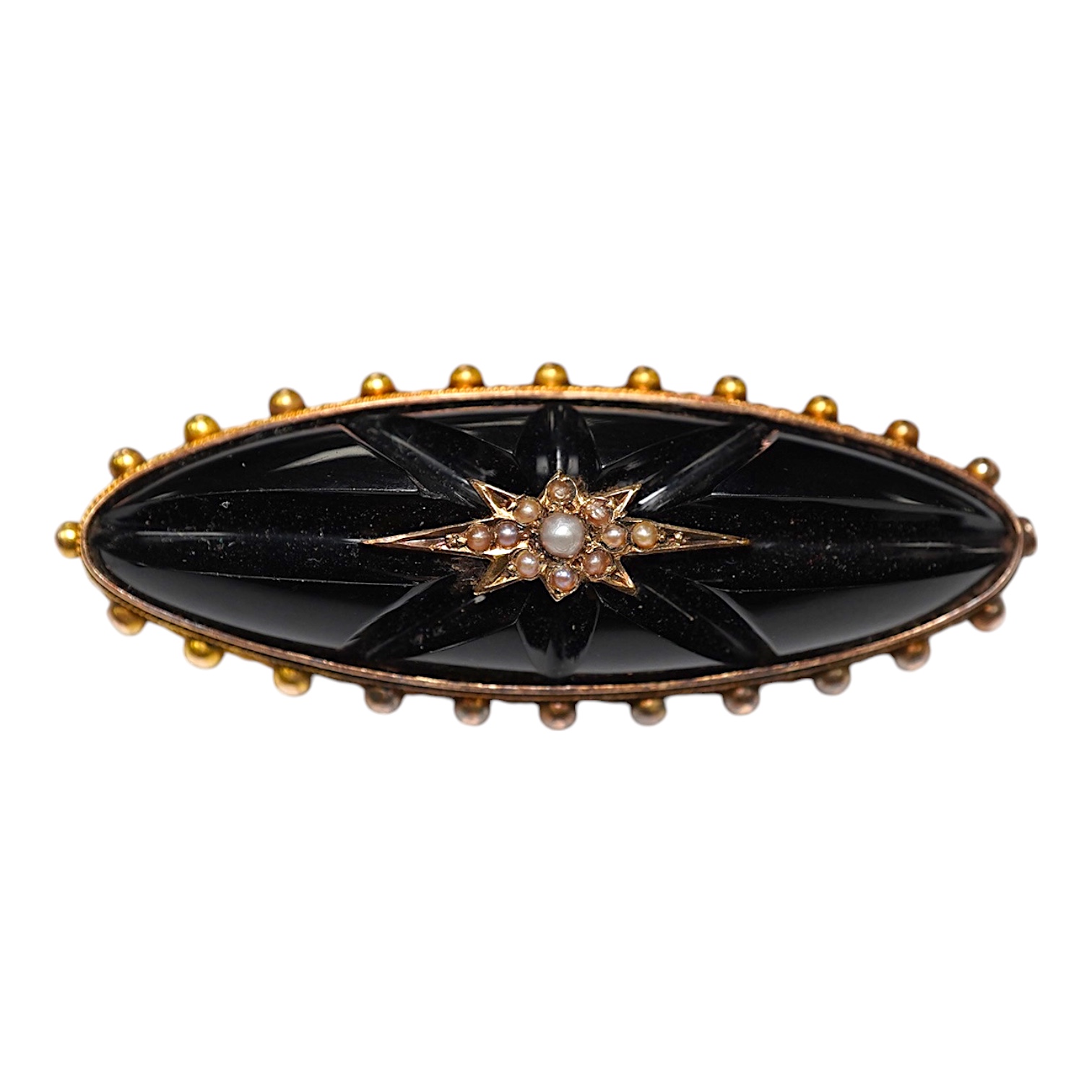 A late Victorian 15ct and carved black onyx set navette shaped mourning brooch, 46mm, gross weight 10.3 grams. Condition - fair